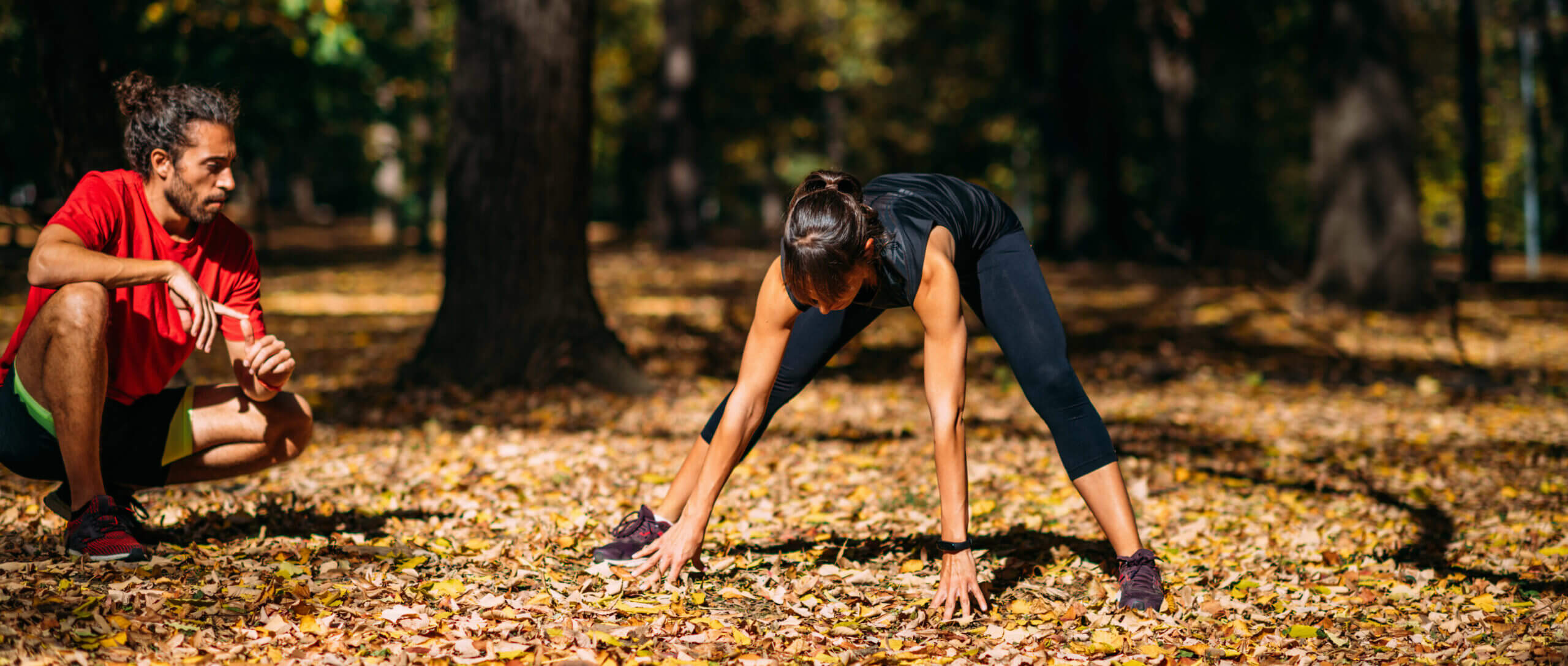 young-couple-stretching-after-training-park (1)